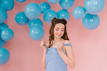 Sexy girl in a pink room