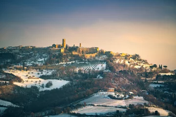 Fotobehang Toscane Snow in Tuscany, Radicondoli village, winter panorama. Siena, Italy  © stevanzz