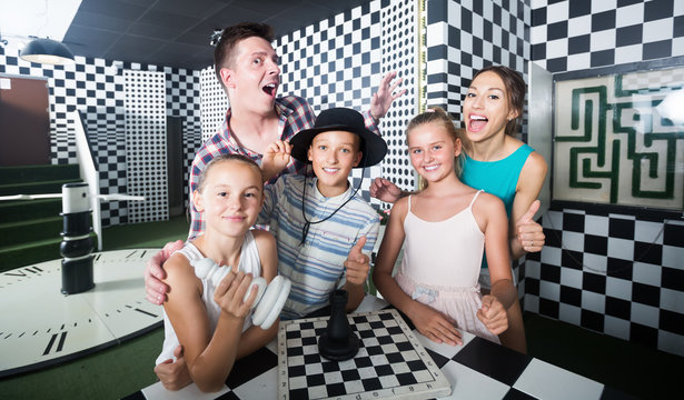 Family with kids are satisfied after visit of escape room