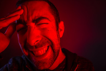 Man is suffering in pain from headache