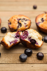 Homemade Blueberry Muffins on a Rustic Wood Table