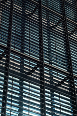 Obraz premium Metal grill type windows of an office building