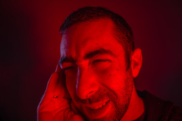 Man is suffering in pain from headache