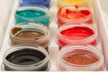 a set of gouache paints in different colors