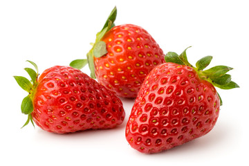 Three strawberries on a white