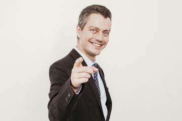 Smiling Adult Business Leader Pointing at You
