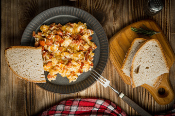 Scrambled eggs with sausage.