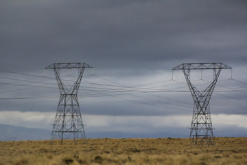 Power Pylons on Desert landscape