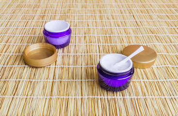 Beauty products on mat