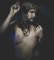 Jesus of Nazareth, representation of the Calvary of Jesus, son of God. He has the wound on his side and the crown of thorns