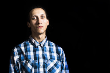 Obraz premium Portrait of a young cool man with dreadlocks