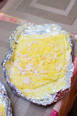 children cook pizza from raw ingredients with their own hands