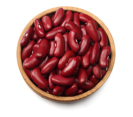 red kidney beans in wooden bowl isolated on white background. top view