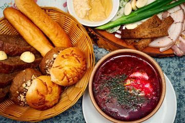 borsch with sour cream and different bread