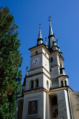 Fototapeta na wymiar Sf. Nicolae (St. Nicholas) Orthodox Church exterior., Brasov, Transylvania, Romania. Famous tourist attraction travel destination vertical postcard.