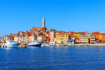 Fototapeta premium Beautiful and cozy medieval town of Rovinj, colorful with houses and church the harbor