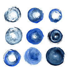 Blue watercolor circles and stains.