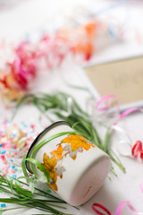 White mug with confetti isolate festive mocap