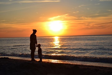 Fototapeta premium Mum and son at the beach