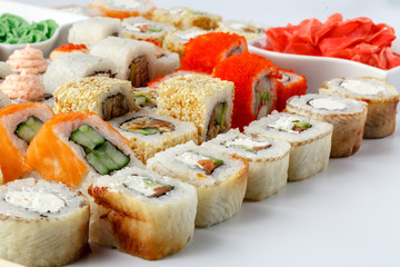 Sushi rolls with salmon and sesame close-up macro shot