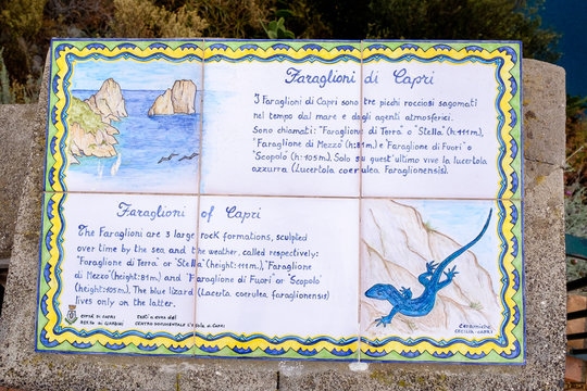 Hand painted tile table describing Faraglioni of Capri, Italy.