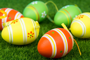 Easter eggs on green grass.