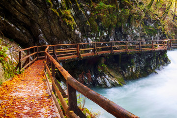 Wonderful Vintgar Gorge canyon at curlicue river and beautiful autumn colors and close to Lake Bled