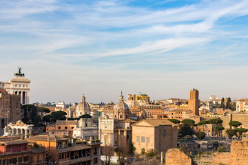 Naklejka premium cityscape of rome italy with domes basilica monuments ruins and modern buildings