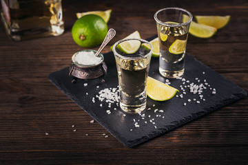 Tequila shot with lime and sea salt