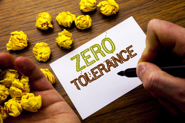 Word, writing Zero Tolerance. Concept for Policy For Punishment written on notebook note paper on...