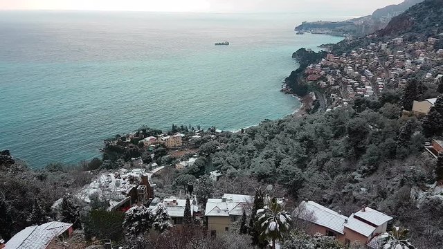 Beautiful Panoramic Aerial View of the Sea And The Mountain on The French Riviera Under The Snow. Roquebrune-Cap-Martin And Monaco - 4K Video
