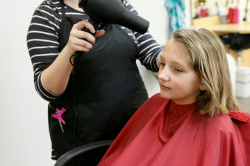 Girl's Haircut Cutting it All Off at Beauty Salon