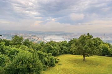Gellert Hill park  against Danube river and Budapest city