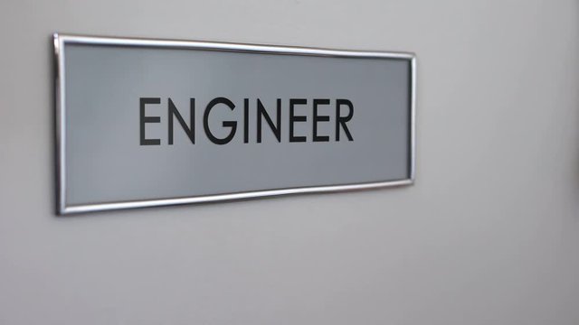 Engineer office door, hand knocking closeup, construction building and design