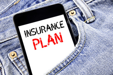 Handwriting Announcement text showing Insurance Plan. Business concept for Health Life Insured Written phone mobile phone, cellphone placed in the man front jeans pocket.