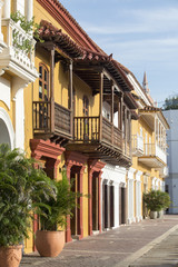 Fototapeta na wymiar Houses in Plaza de la Aduana - Cartagena de Indias, Colombia