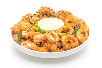 fried seafood (squids, shrimps, mussels) with sauce