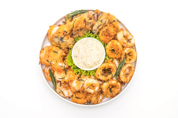 fried seafood (squids, shrimps, mussels) with sauce