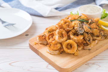 fried seafood (squids, shrimps, mussels) with sauce