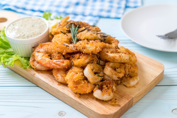 fried seafood (squids, shrimps, mussels) with sauce