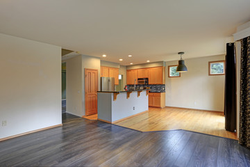 Small compact kitchen room with light wood cabinetry
