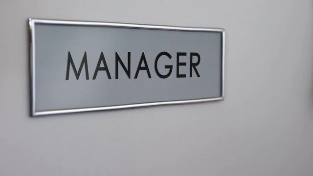 Manager office door, hand knocking closeup customer support department, business