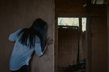 Stop violence,Depressive woman incidental rope in old disturbed room