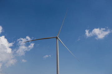 wind turbine on blue sky with Cloud