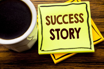 Handwritten text showing Success Story. Business concept for Inspiration Motivation written on sticky note paper on the wooden wood background with coffee cup