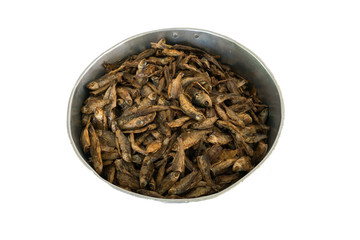 Dry fish in bucket on white background.