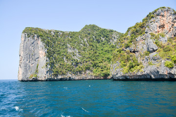 The island of Phi Phi.Island view from a boat on the sea background.Thailand