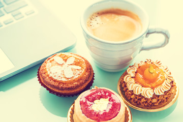 Handcrafted gourmet fruit tarts and pastries with coffee