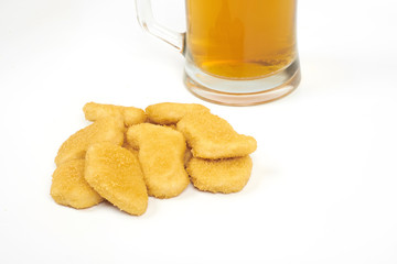 Chicken nuggets and beer isolated on white background