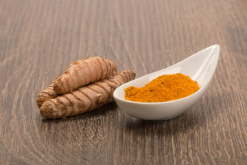 Raw and ground turmeric,
